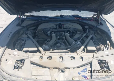 2013 BMW 750 I z USA, uszkodzony, nr VIN WBAYA8C57DC996601